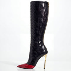 Black knee-high boot with red sole and gold zipper on a white background