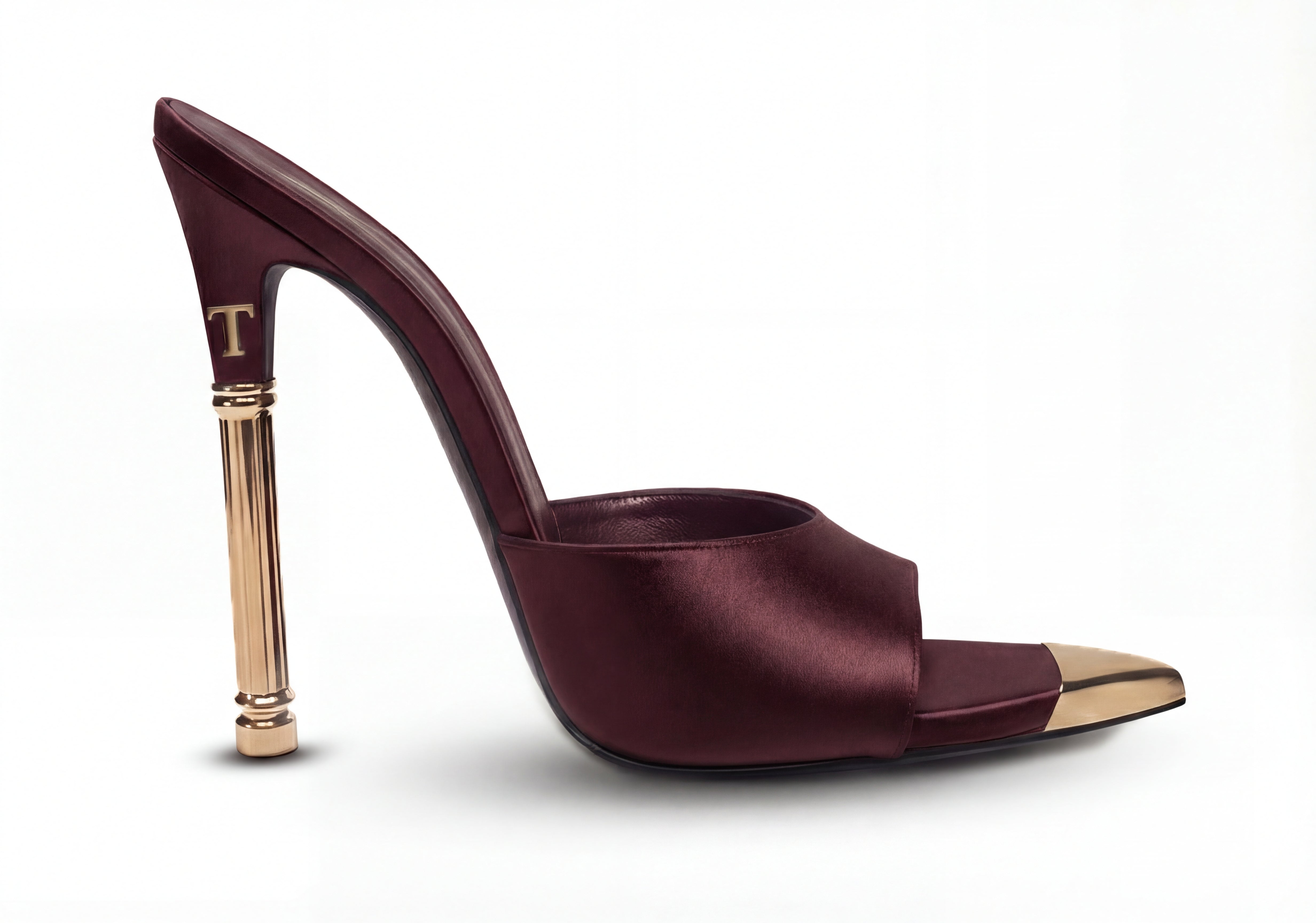 Maroon high-heeled shoe with gold accents on a white background